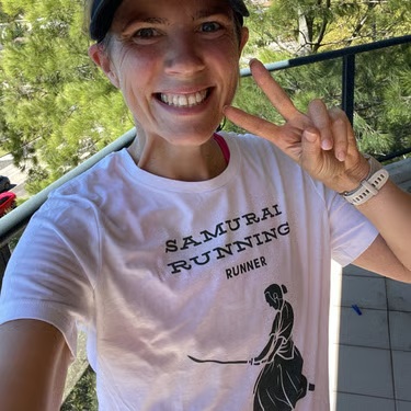 Dani Egan wearing a Samurai Running T-shirt