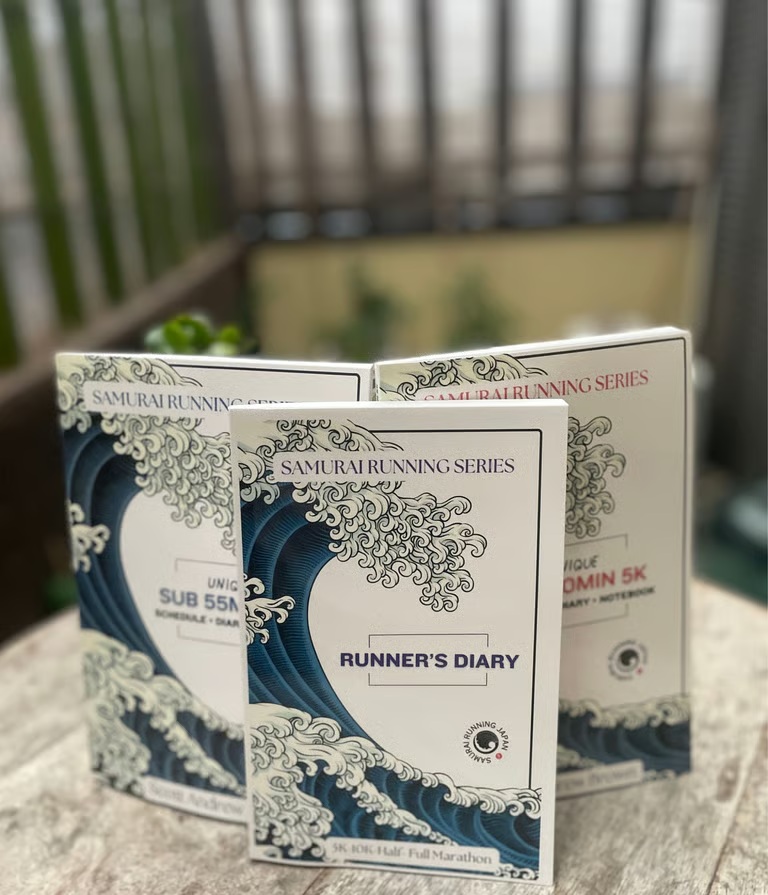 Samurai Running guides for a sub-55-minute 10K and sub-30-minute 5K, with the Runner’s Diary